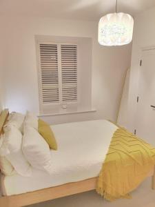 Postel nebo postele na pokoji v ubytování Haworth Hideaway