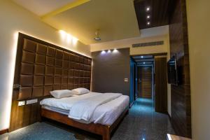 Postel nebo postele na pokoji v ubytování HOTEL VIJAYARANI