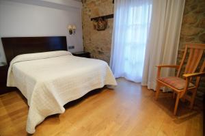 Postel nebo postele na pokoji v ubytování Casa Rómulo