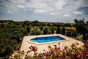 Bazén v ubytování Finca Rural Son Rabassa nebo v jeho okolí