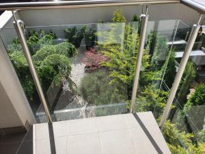 A garden outside gyorapartman-TOP