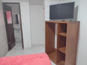Sjónvarps- og/eða afþreyingartæki á Hotel Risaralda