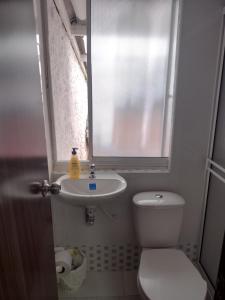 Baðherbergi á Hotel Risaralda
