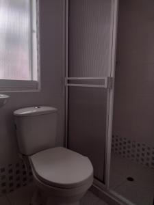Baðherbergi á Hotel Risaralda