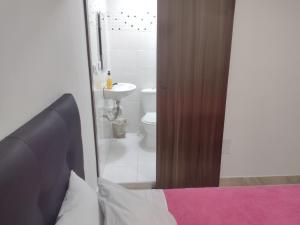 Baðherbergi á Hotel Risaralda