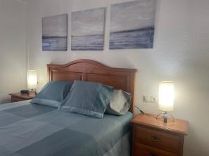 Posteľ alebo postele v izbe v ubytovaní Hervas Centro Apartamento IDEAL FAMILIAS 6 adultos y 2 niños-