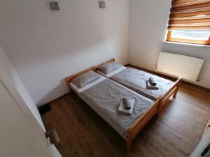Postel nebo postele na pokoji v ubytování Rooms Delux Sarajevo