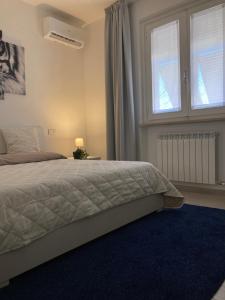 Postel nebo postele na pokoji v ubytování SUNSET SUITE