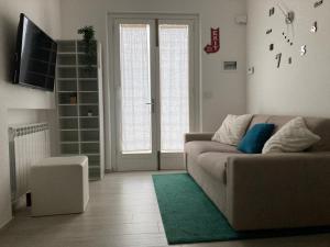 Area soggiorno di SUNSET SUITE