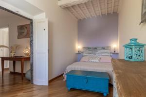 Ένα ή περισσότερα κρεβάτια σε δωμάτιο στο Il Lumachino