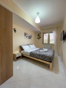 A bed or beds in a room at Casa di Aida