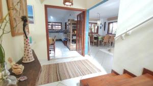 Giường trong phòng chung tại Maison de La Mer 300m da praia