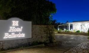 a sign for a hotel in front of a building at Hotel Bellavista in Anacapri