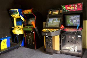 three video games are lined up next to each other at FairBridge Extended Stay, a Kitchenette Hotel in Idaho Falls