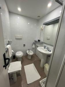 Kúpeľňa v ubytovaní Ilga Hotel