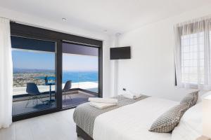 Posteľ alebo postele v izbe v ubytovaní Regal Residence