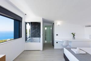 Posteľ alebo postele v izbe v ubytovaní Regal Residence
