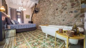 Postel nebo postele na pokoji v ubytování Groc Rooms