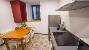 Kuchyň nebo kuchyňský kout v ubytování Groc Rooms