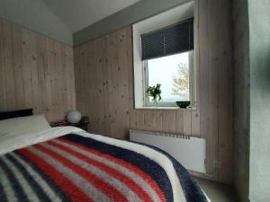 Ένα ή περισσότερα κρεβάτια σε δωμάτιο στο Guesthouse Nýp