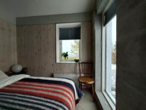 Ένα ή περισσότερα κρεβάτια σε δωμάτιο στο Guesthouse Nýp