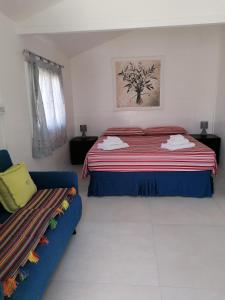 Postel nebo postele na pokoji v ubytování I Mirti - Home Holiday + 37 fotografií