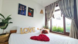 Postel nebo postele na pokoji v ubytování Hotel Làng Kò Hơ