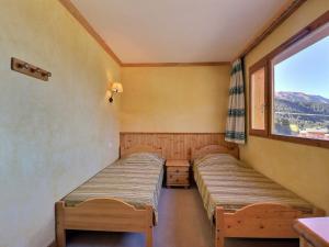 Appartement Méribel, 2 pièces, 4 personnes - FR-1-182-186にあるベッド