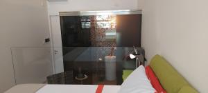 Posteľ alebo postele v izbe v ubytovaní Loft 19