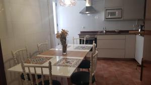 Una cocina o zona de cocina en Casa Santa Maria I con barbacoa
