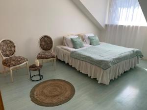 Posteľ alebo postele v izbe v ubytovaní Residence Bella Vista
