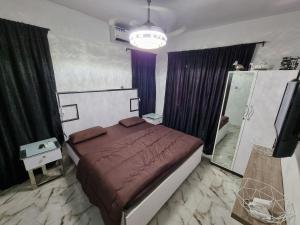 Voodi või voodid majutusasutuse CG Apartments toas