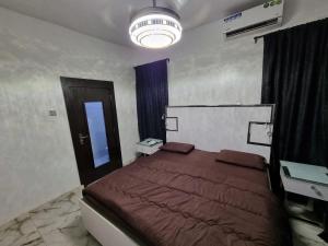Voodi või voodid majutusasutuse CG Apartments toas