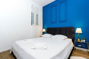 Postelja oz. postelje v sobi nastanitve Beautiful apartment in Split center
