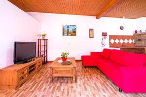 TV a/nebo společenská místnost v ubytování Casa Unifamiliar