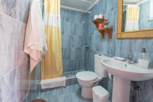 Koupelna v ubytování Casa Unifamiliar + 5 fotografií