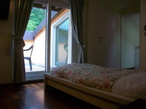 Postel nebo postele na pokoji v ubytování B&B L'Albero Maestro