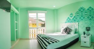 Postel nebo postele na pokoji v ubytování San Felicin Hostel + 37 fotografií