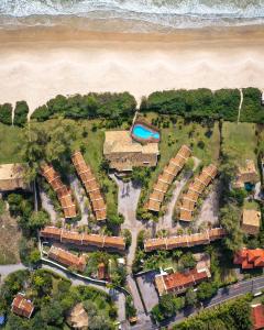 an aerial view of a resort near the beach at Antares Club Hotel Lagoinha in Florianópolis