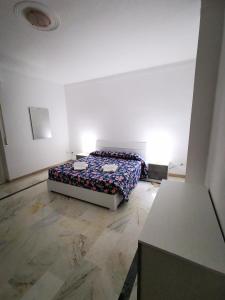 Łóżko lub łóżka w pokoju w obiekcie Casa Buena Vista
