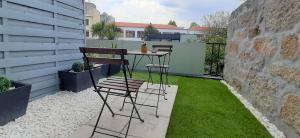 Un patio o zona al aire libre en Boavista Class Inn