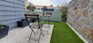 Un patio o zona al aire libre en Boavista Class Inn