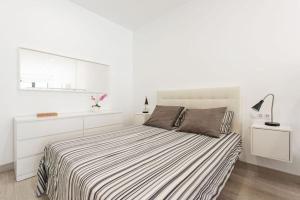 Posteľ alebo postele v izbe v ubytovaní Charming loft B