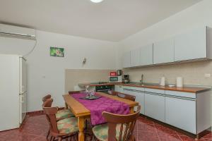 Kuchyň nebo kuchyňský kout v ubytování House Cattleya