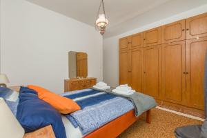 Postel nebo postele na pokoji v ubytování House Cattleya
