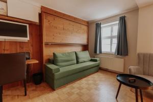 Posezení v ubytování Hotel Gasthaus zur Sonne