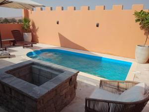 Bazén v ubytování Desert Inn Resort and Camp nebo v jeho okolí