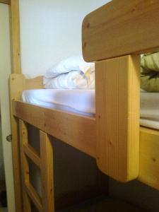 a bunk bed in a bunk room with a bunk bedscribed at Cosy at L'Atrey La Tania in Courchevel