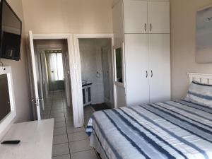 Postel nebo postele na pokoji v ubytování Topanga Holiday Home