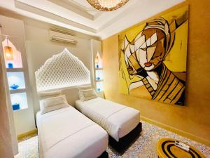 Letto o letti in una camera di Maison Chafia Boutique Hôtel & Spa